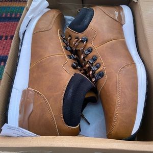 Brand new men’s tan leather shoes.  No brand name.  Size 44 European / 11 US